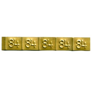 brass embossed tag